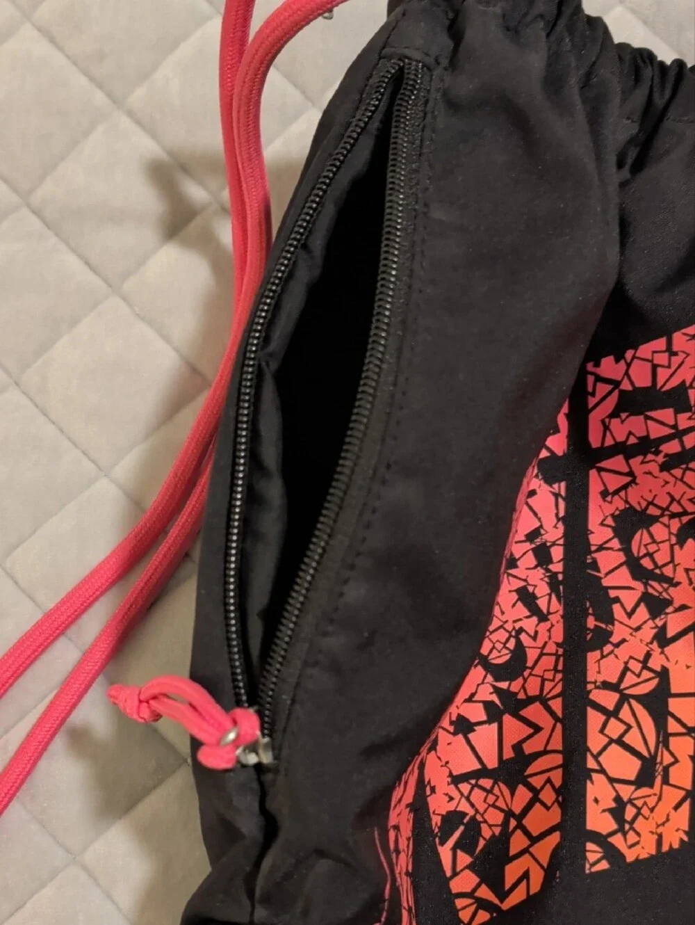 Nike Black Gym Sack with Neon Pink-to-Neon Orange Logo and Pink Cords